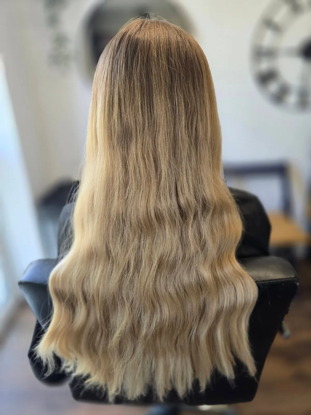 Long blonde hair with soft waves